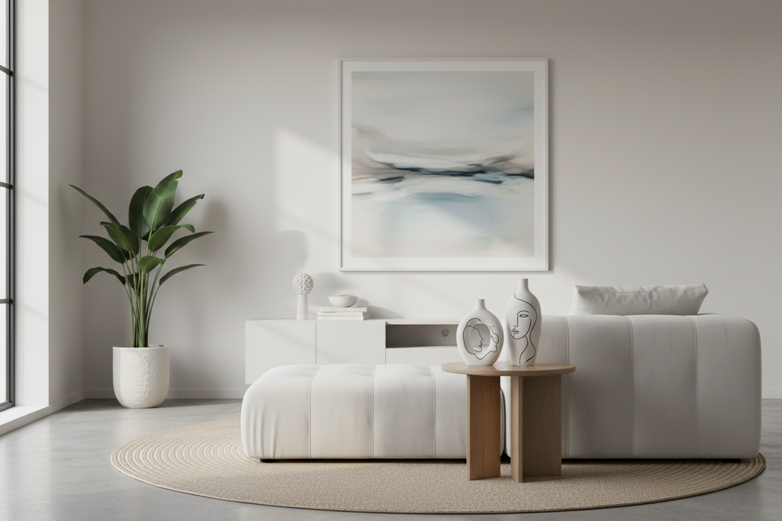A professional home decor setup featuring abstract line vases, scent candle, and cotton waffle knit throws, by Fit-Flow.