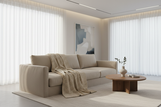 A professional home sanctuary featuring cotton waffle knit throws, scent candle, and abstract line vases, by Fit-Flow.