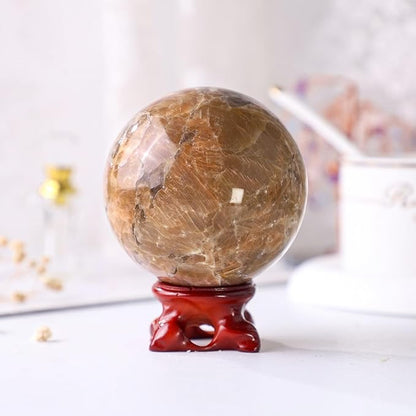 Nupuyai Natural Orange Moonstone Crystal Ball with Resin Stand, Healing Crystal Sphere for Home Decor 2.4"-2.76"(61mm-70mm)