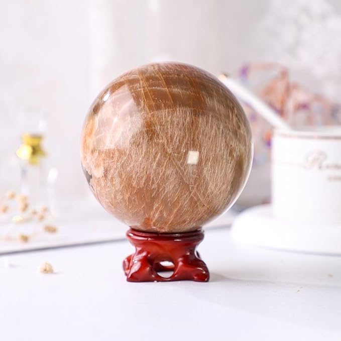 Nupuyai Natural Orange Moonstone Crystal Ball with Resin Stand, Healing Crystal Sphere for Home Decor 2.8"-3.15"(71mm-80mm)