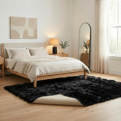 Super Area Rugs Ultra Soft & Fluffy Faux Sheepskin Rug, Black 6 x 9 Feet Carpet for Bedroom Living Room