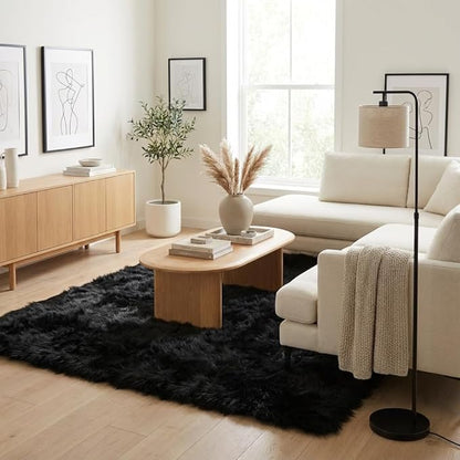 Super Area Rugs Ultra Soft & Fluffy Faux Sheepskin Rug, Black 6 x 9 Feet Carpet for Bedroom Living Room