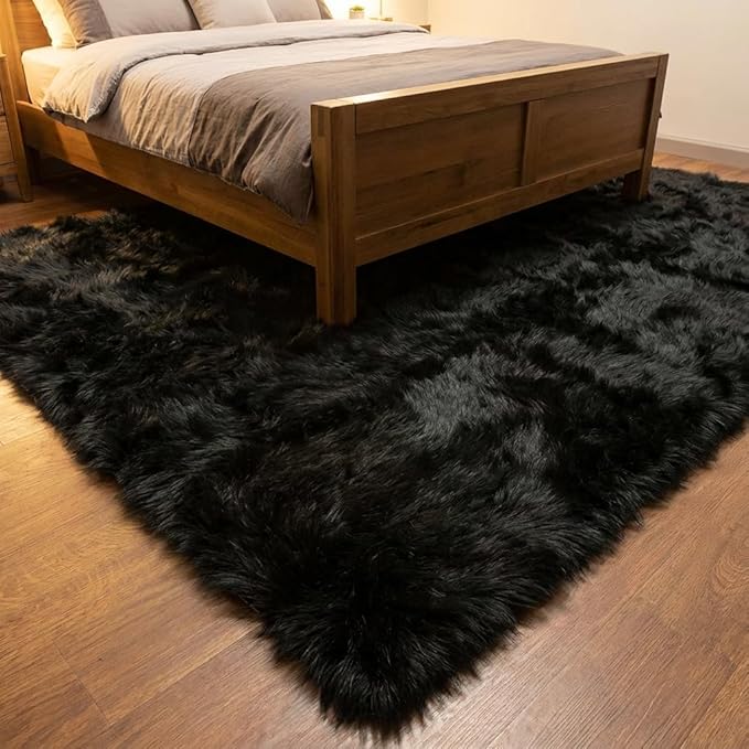 Super Area Rugs Ultra Soft & Fluffy Faux Sheepskin Rug, Black 6 x 9 Feet Carpet for Bedroom Living Room