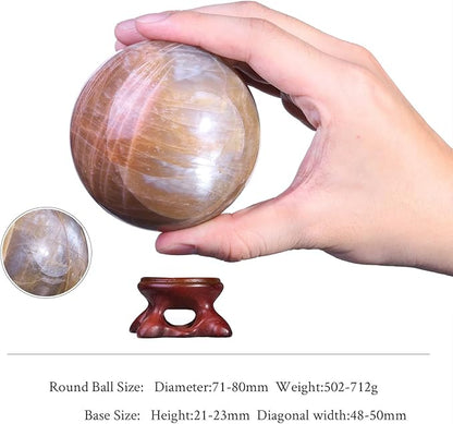 SUNYIK Natural Orange Moonstone Ball Sphere with Resin Stand Polished Crystal Sphere Stone Figurine Decor for Home Office Tabletop, 2.8-3.1”(71-80mm)