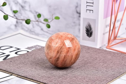 JIC Gem Orange Moonstone Crystal Ball Healing Crystals Sphere with Decorative Wooden Stand 2-2.3 inch (50-60mm)