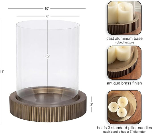 Kate and Laurel Rooks Modern Large Metal Pillar Candle Holder with Hurricane, 10 Inch Diameter, Antique Brass, Transitional Ribbed Oversized Hurricane Candle Holder with Glass Cylinder for Living Room