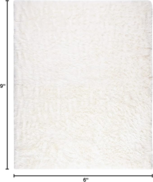 SAFAVIEH Faux Sheep Skin Collection Area Rug - 6' x 9', Ivory, Silken Glam Design, Non-Shedding & Easy Care, 2.35-inch Thick Ideal for High Traffic Areas in Living Room, Bedroom (FSS235A)