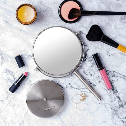 OVENTE 6'' Tabletop Makeup Mirror with 1X/7X Magnification, 360° Swivel Design, Double-Sided Free-Standing Vanity Mirror Perfect for Dresser, Bedroom and Office Desk, Nickel Brushed MNLT60BR1X7X