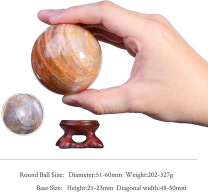 SUNYIK Natural Orange Moonstone Ball Sphere with Resin Stand Polished Crystal Sphere Stone Figurine Decor for Home Office Tabletop, 2-2.3"(51-60mm)