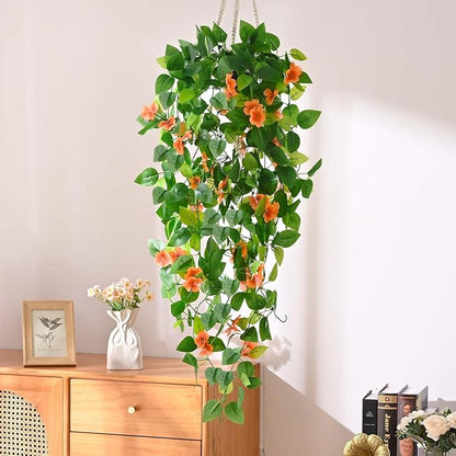 BLEUM CADE Artificial Hanging Flowers for Outdoors, 4pcs Fake Hanging Plants Pothos Vines with Orange Flowers for Wall Home Living Room Indoor Outdoor Fall Decor (No Baskets)