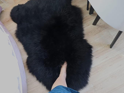 Woolous Black Sheepskin Rug, Genuine New Zealand Lambskin Wool, Real Sheep Skin Throw for Bedroom, Living Room, Sofa, or Chair (Single Pelt, 2x3 ft)