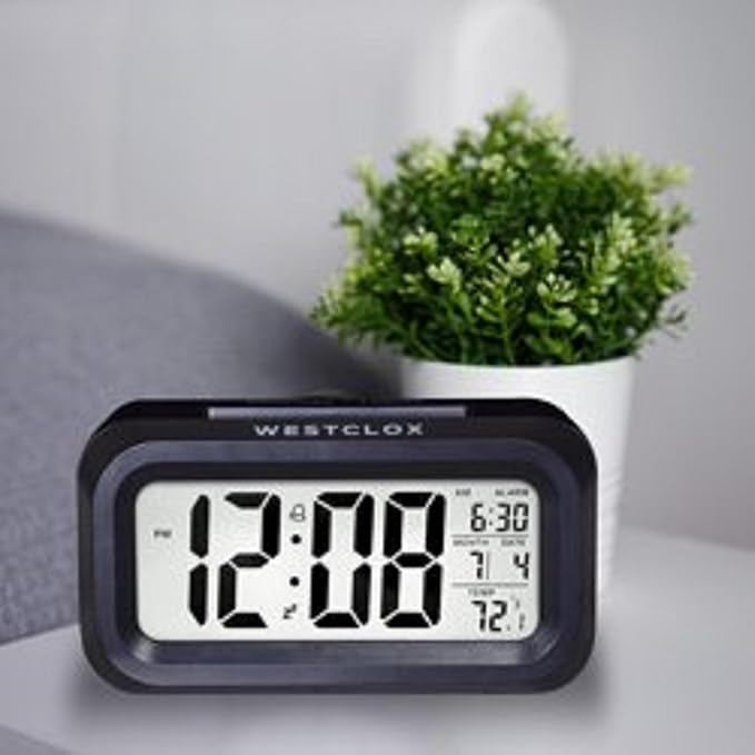 Westclox Digital LCD Alarm Clock with Large 1.4" Display, White Backlight on Demand, Month/Date and Temperature Display, Ascending 5-Minute Snooze Alarm – Bedroom or Office (Black)
