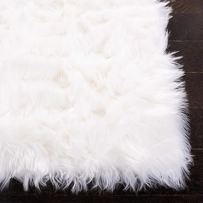 SAFAVIEH Faux Sheep Skin Collection Area Rug - 6' x 9', Ivory, Silken Glam Design, Non-Shedding & Easy Care, 2.35-inch Thick Ideal for High Traffic Areas in Living Room, Bedroom (FSS235A)