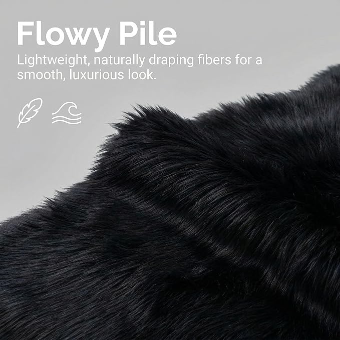 Super Area Rugs Ultra Soft & Fluffy Faux Sheepskin Rug, Black 2 x 3 Feet Carpet for Bedroom Living Room