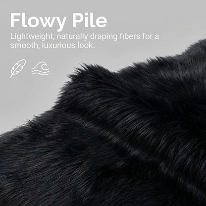 Super Area Rugs Ultra Soft & Fluffy Faux Sheepskin Rug, Black 2 x 3 Feet Carpet for Bedroom Living Room