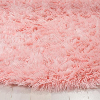 SAFAVIEH Faux Sheep Skin Collection 4' Round Pink FSS235G Silken Glam 2.35-inch Thick Area Rug