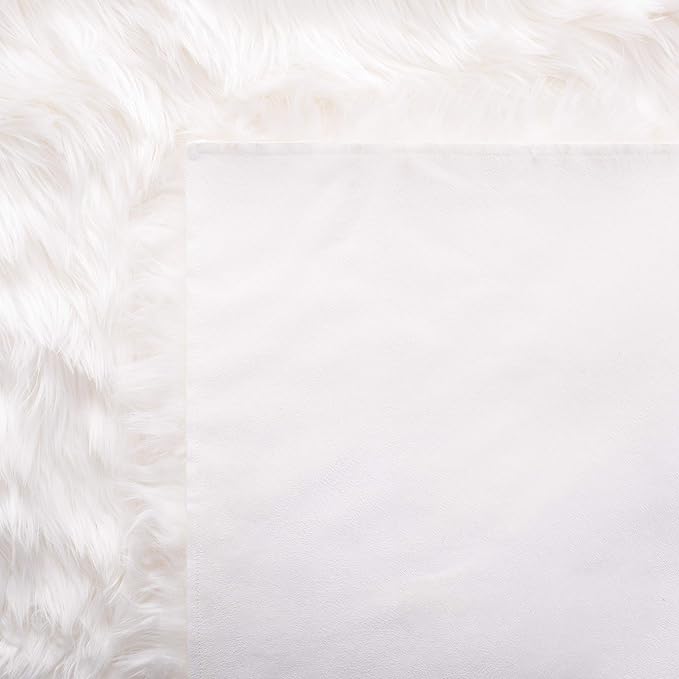 SAFAVIEH Faux Sheep Skin Collection Accent Rug - 4' x 6', Ivory, Silken Glam Design, Non-Shedding & Easy Care, 2.35-inch Thick Ideal for High Traffic Areas in Entryway, Living Room, Bedroom (FSS235A)