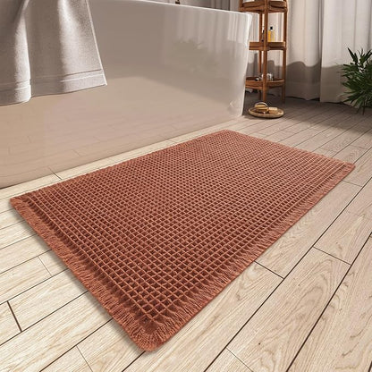 AMOAMI Upgraded Waffle Bath Mat, Super Absorbent Non Slip Bath Mats for Bathroom Floor, Machine Washable Bathroom Rugs with Tassels, Rubber Backed Bathroom Mats, Ultra Soft, 17" x 24", Dirty Orange