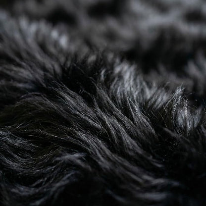 Super Area Rugs Ultra Soft & Fluffy Faux Sheepskin Rug, Black 2 x 3 Feet Carpet for Bedroom Living Room