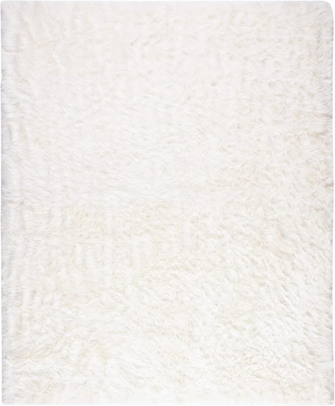 SAFAVIEH Faux Sheep Skin Collection Area Rug - 6' x 9', Ivory, Silken Glam Design, Non-Shedding & Easy Care, 2.35-inch Thick Ideal for High Traffic Areas in Living Room, Bedroom (FSS235A)