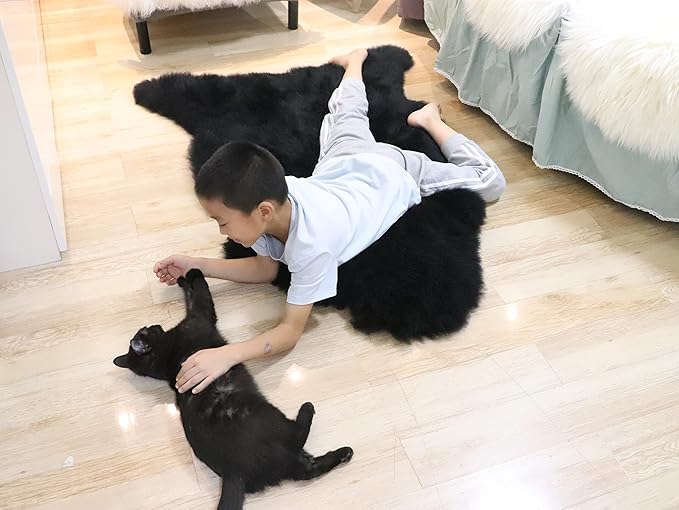 Woolous Black Sheepskin Rug, Genuine New Zealand Lambskin Wool, Real Sheep Skin Throw for Bedroom, Living Room, Sofa, or Chair (Single Pelt, 2x3 ft)