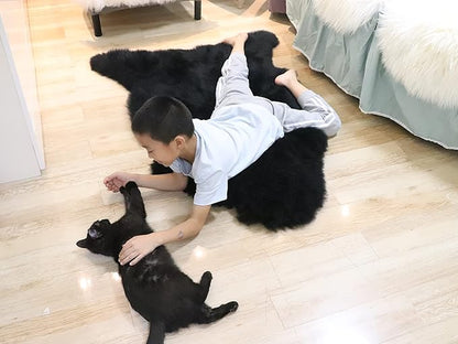 Woolous Black Sheepskin Rug, Genuine New Zealand Lambskin Wool, Real Sheep Skin Throw for Bedroom, Living Room, Sofa, or Chair (Single Pelt, 2x3 ft)