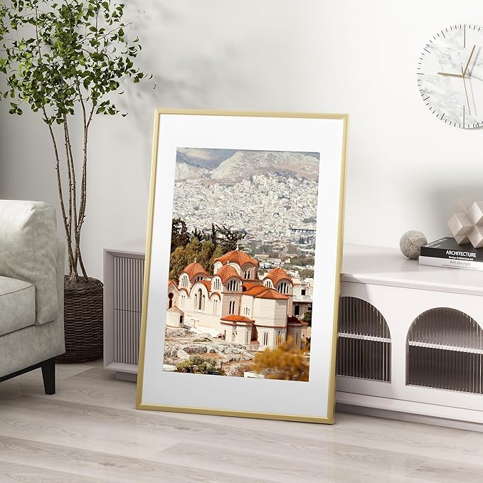16x24 inch Metal Poster Frame - 16 x 24 Thin Aluminum Picture Frames Matted for 12x18 Photos, Artworks, Prints, Puzzle - High Definition Plexiglass - Vertical and Horizontal Display - Wall Hook Hanging Hardware Included - Gold, Set of 1