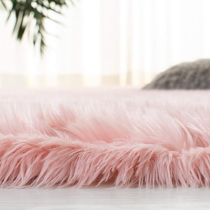 SAFAVIEH Faux Sheep Skin Collection 5' Round Pink FSS235G Silken Glam 2.35-inch Thick Area Rug