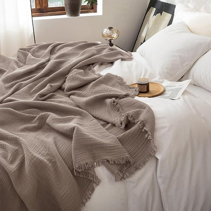 FOSSA Muslin Blanket with Fringe - 4-Layer 100% Cotton Gauze Super Soft & Breathable Throw -Lightweight Decorative Cooling Blanket for Bed, Sofa, Office (Pale Brown, Oversize Queen (98" × 98"))