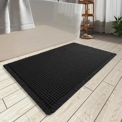 AMOAMI Upgraded Waffle Bath Mat, Super Absorbent Non Slip Bath Mats for Bathroom Floor, Machine Washable Bathroom Rugs with Tassels, Rubber Backed Bathroom Mats, Ultra Soft, 24" x 36", Black