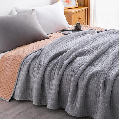NTBAY 3 Layers Cotton Muslin 68x92 Twin Bed Blanket, Super Soft Breathable Thermal Yarn Dyed Quilt for Adults, Perfect Lightweight Blanket for Couch Sofa Bed All Seasons, Orange Dot