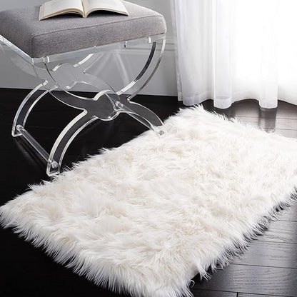SAFAVIEH Faux Sheep Skin Collection Accent Rug - 2'6" x 4', Ivory, Silken Glam Design, Non-Shedding & Easy Care, 2.35-inch Thick Ideal for High Traffic Areas in Foyer, Living Room, Bedroom (FSS235A)