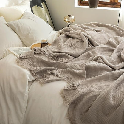 FOSSA Muslin Blanket with Fringe - 4-Layer 100% Cotton Gauze Super Soft & Breathable Throw -Lightweight Decorative Cooling Blanket for Bed, Sofa, Office -Twin XL Size 90" × 66" (Beige Gray)