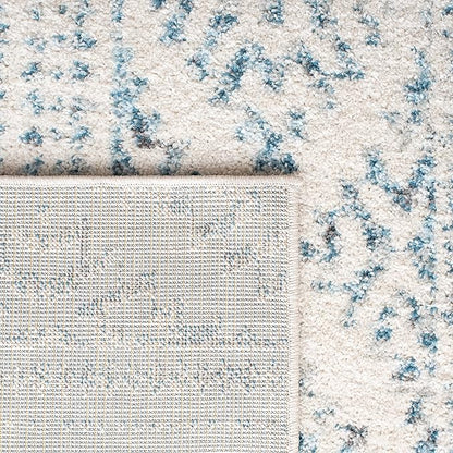 SAFAVIEH Tulum Collection Area Rug - 5'3" x 7'6", Ivory & Turquoise, Moroccan Boho Tribal Design, Non-Shedding & Easy to Clean, Ideal for Living Room, Bedroom, Dining Space (TUL272E)